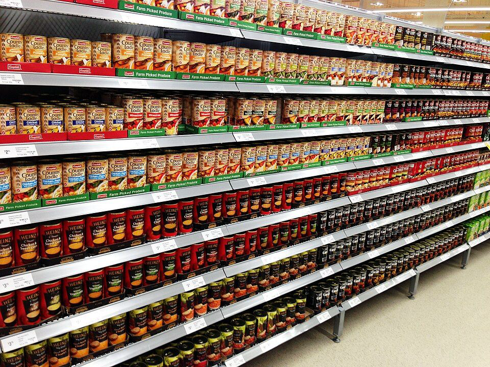 Archival 2012 view of canned goods on shelves at a Coles supermarket in Melbourne; not the new LMCT+ store.