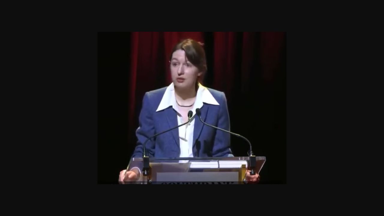 Sally Rooney speaking at a podium in September 2024; archival image, not from the October 2026 announcement