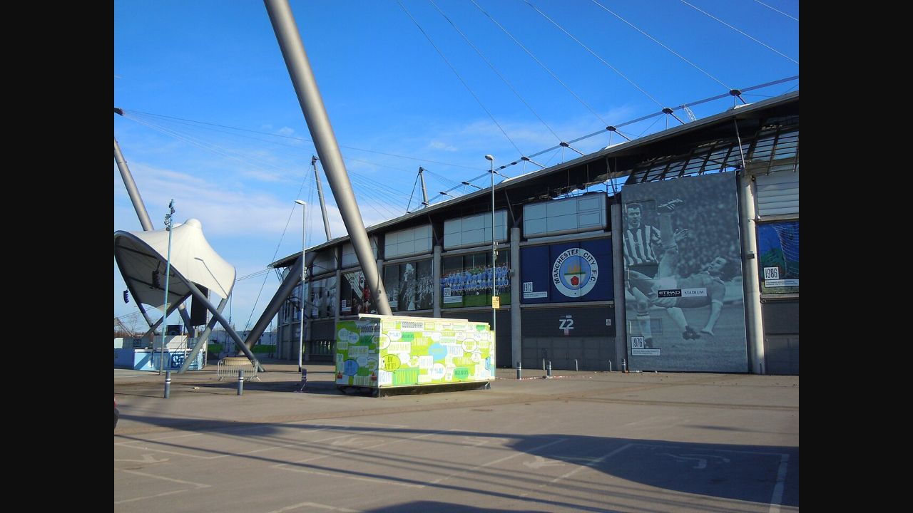 Archival exterior of the Etihad Stadium and Manchester City campus in 2015; not a photograph of the PSG match