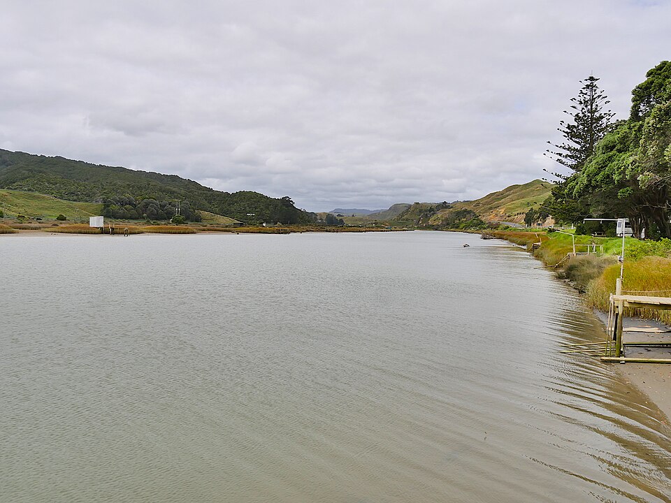 Archival 2017 view of the Awakino River near Awakino village by Ulrich Lange; it does not show the October 2026 flooding or the affected road.