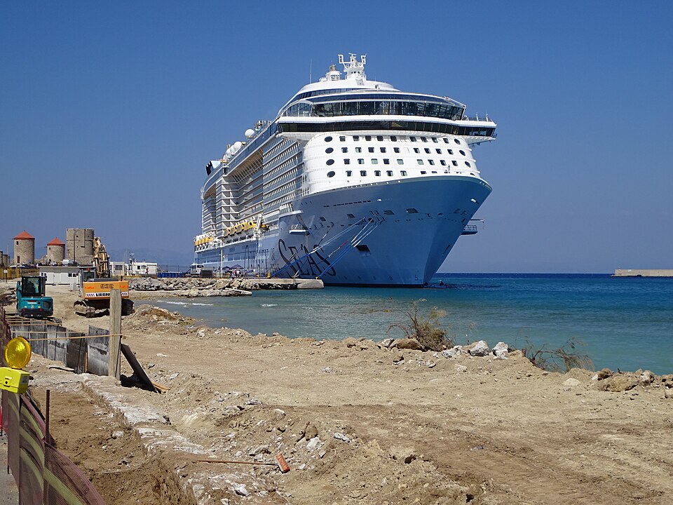 Archival 2024 photograph of Royal Caribbean’s Odyssey of the Seas moored at Rhodes, by Pjotr Mahhonin; not a photo of the October 2026 rescue.